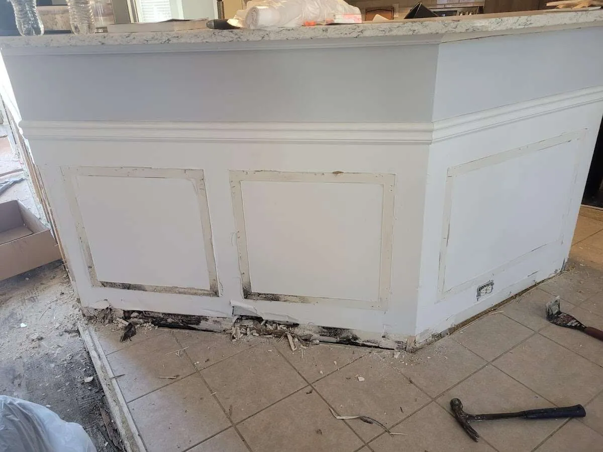 Water damage and mold on kitchen during Storm Damage Restoration in Benson